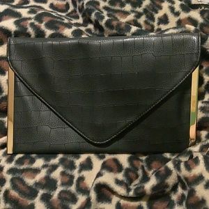 Black and gold clutch.